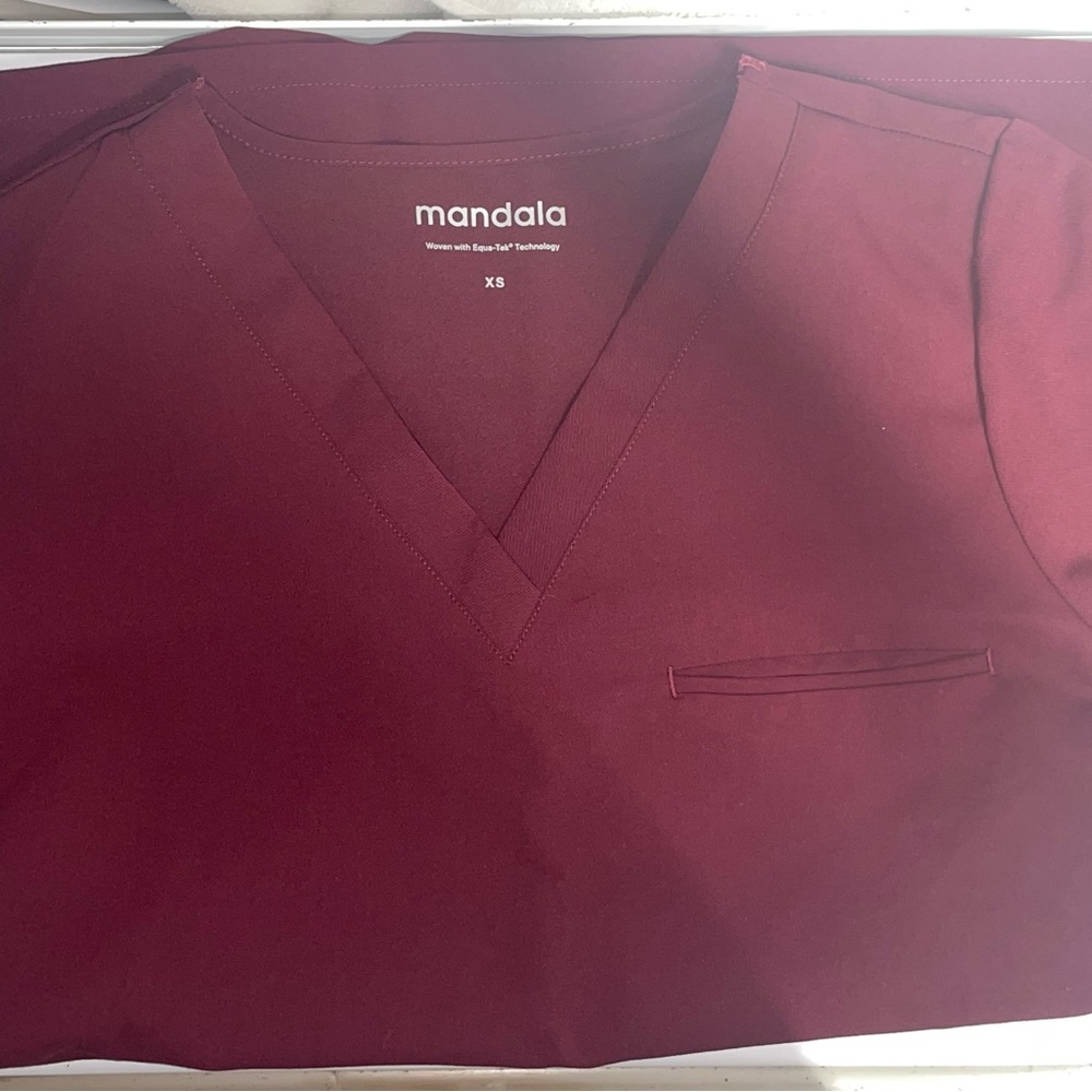 Mandala one pocket scrub top in wine.